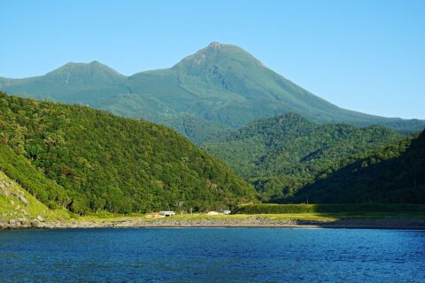 Mount Rausu view from the Sea of Okhotsk at Shari, Hokkaido prefecture, Japan.