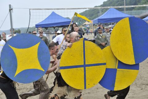 Sailors from Naval Air Facility Misawa Security Department take part in the 2013 Navy Misawa Boat Regatta, Aug. 16, 2013. Naval Air Facility Misawa organizes this annual, lighthearted event with each team tasked with bui