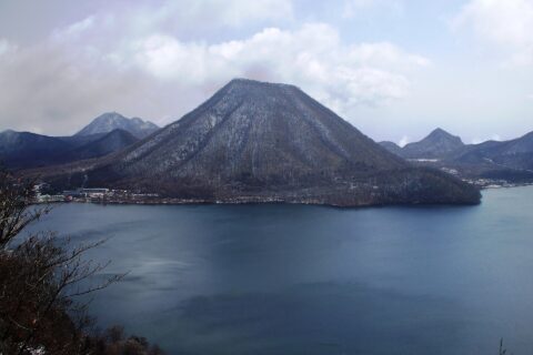 Mount Harunafuji and Lake Haruna from Suzuri Rock on Mount Kamon. A scene of Mount Haruna, Gunma, Japan.