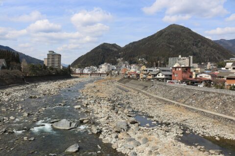 Hida River and Gero Onsen seen from Mutsumi Bridge in Gero, Gifu prefecture, Japan.