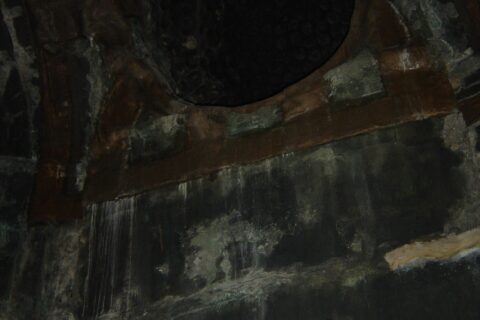 An image of the interior of the Kamakura Daibutsu. The hole near the top is the hollow form of the statue's head.
