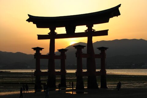 Itsukushima-jinja torii at sunset, Miyajima Island, Hiroshima Prefecture, Japan.