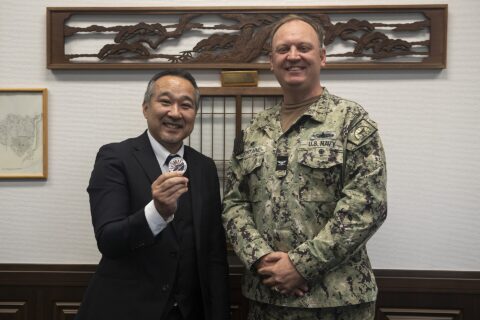 Mayor Takashi Kojima of Shintomi Town, Miyazaki Prefecture, and Capt. Michael Fontaine, Commander, Fleet Activities Sasebo (CFAS), pose for a photo after an office call at CFAS Headquarters in Sasebo, Japan, Feb. 7, 2025