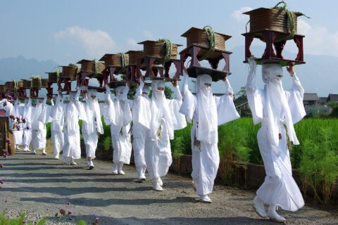 This is a picture used to show the women clad in white called Unari in the annual festival called the Onda Matsuri that occurs every year at Aso shrine in Aso city, Kumamoto Prefecture. The Unari are part of a larger pro