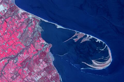 The Notsuke Peninsula is on the east coast of Hokkaido, Japan. Its name is derived from the Ainu word for jawbone. The curved peninsula is the longest sandspit in the country (26 km), formed by the deposition of sand car